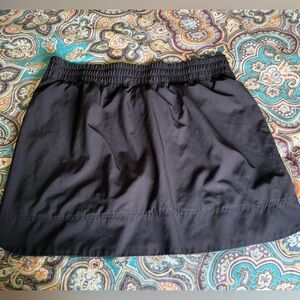 Black pull on skort with two front pockets
